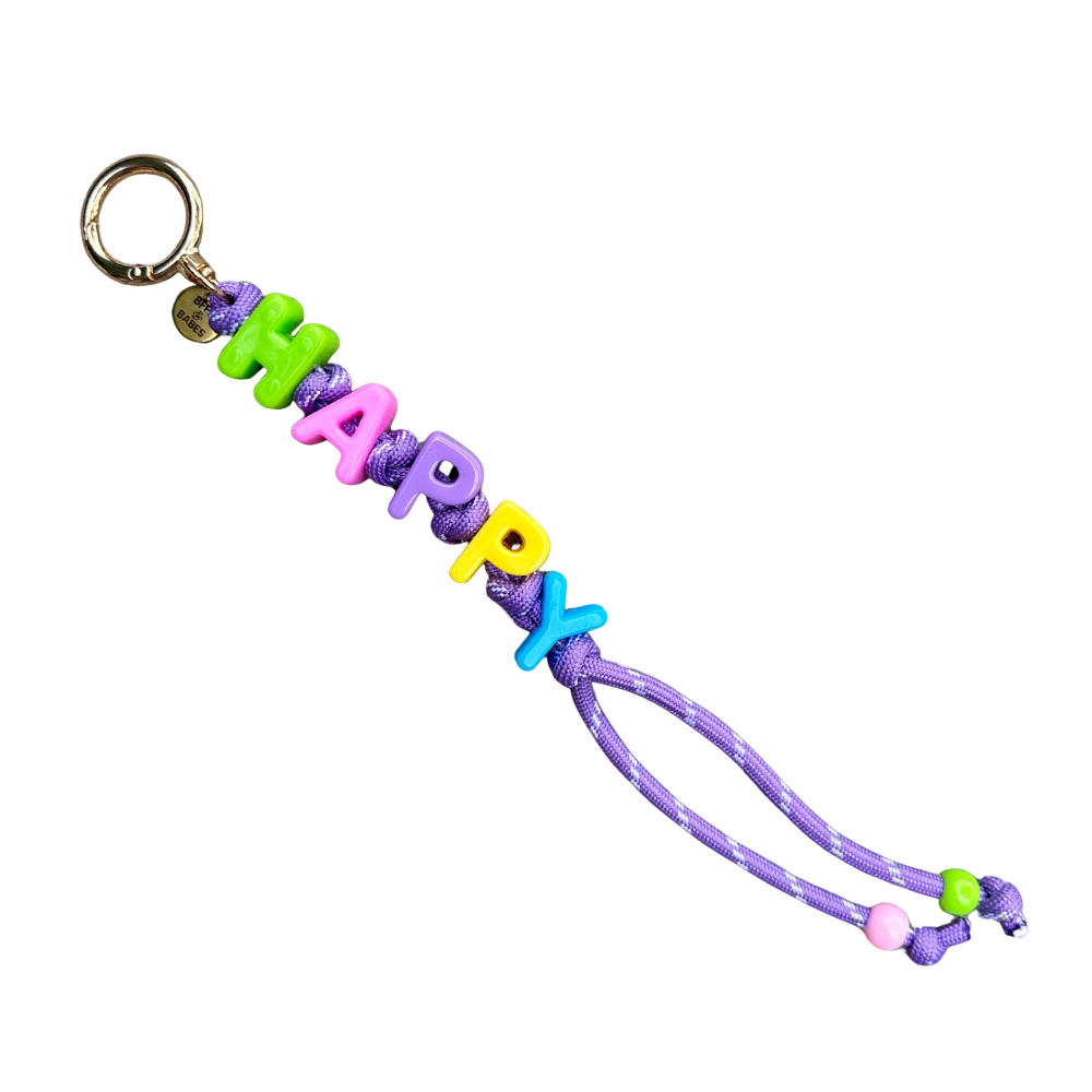 Keychain with colorful letters spelling 'HAPPY' on a white background