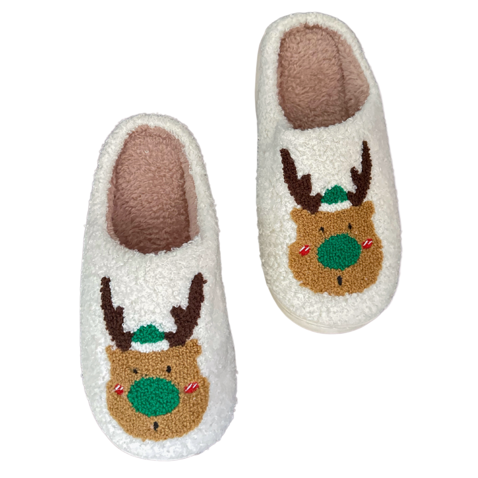 Pair of slippers with reindeer design on a white background