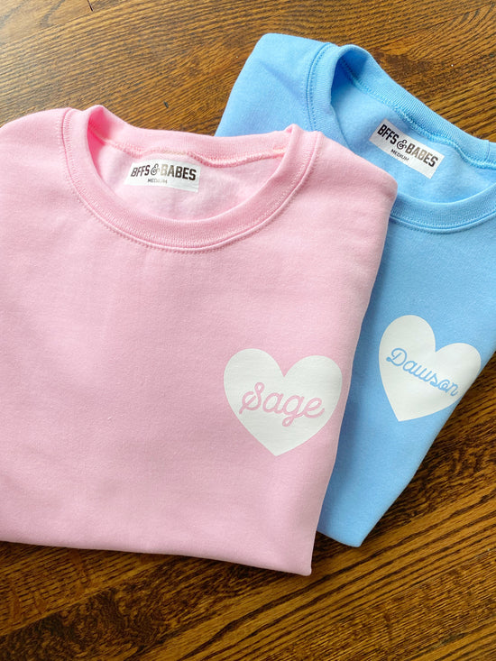 Light Pink Sweatshirt with white glitter heart and script love on