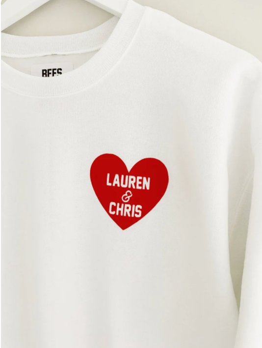 White sweatshirt sales with red hearts