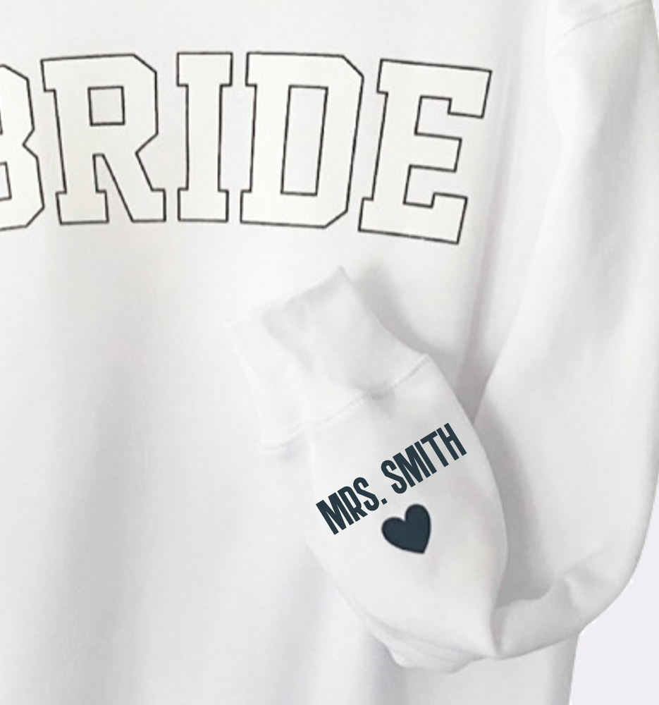 
                
                    Load image into Gallery viewer, LOVE ON THE CUFF ♡ white bride sweatshirt with personalized cuff
                
            